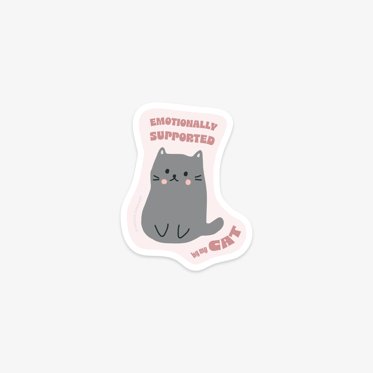 Vinyl sticker with a cat illustration and text 'Emotionally Supported by my Cat' on a light pink background