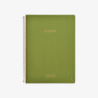 Green notebook with spiral binding on a white background