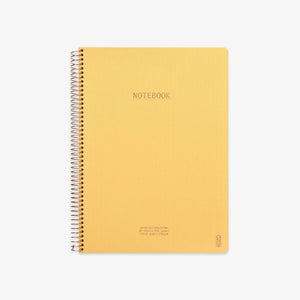 Yellow notebook with spiral binding on a white background