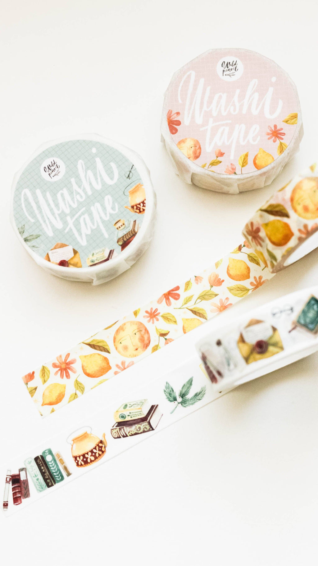 Two washi tape with colorful designs on a white surface
