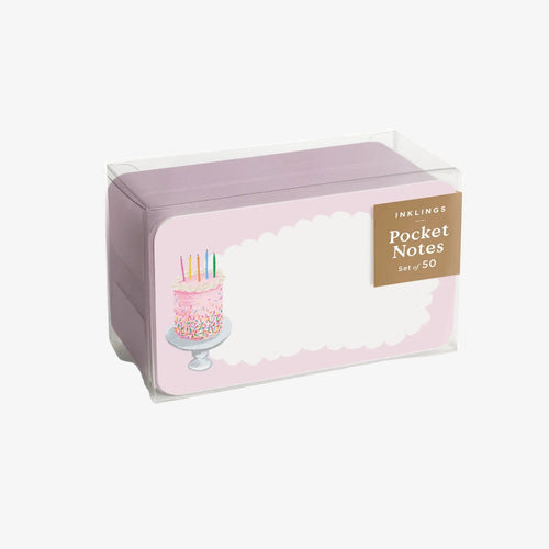 Box of pocket notes with a birthday cake illustration on a white background