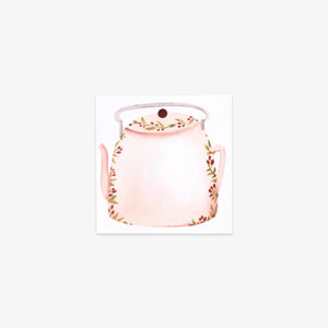 Decorative sticky note with a teapot with floral design on a white background