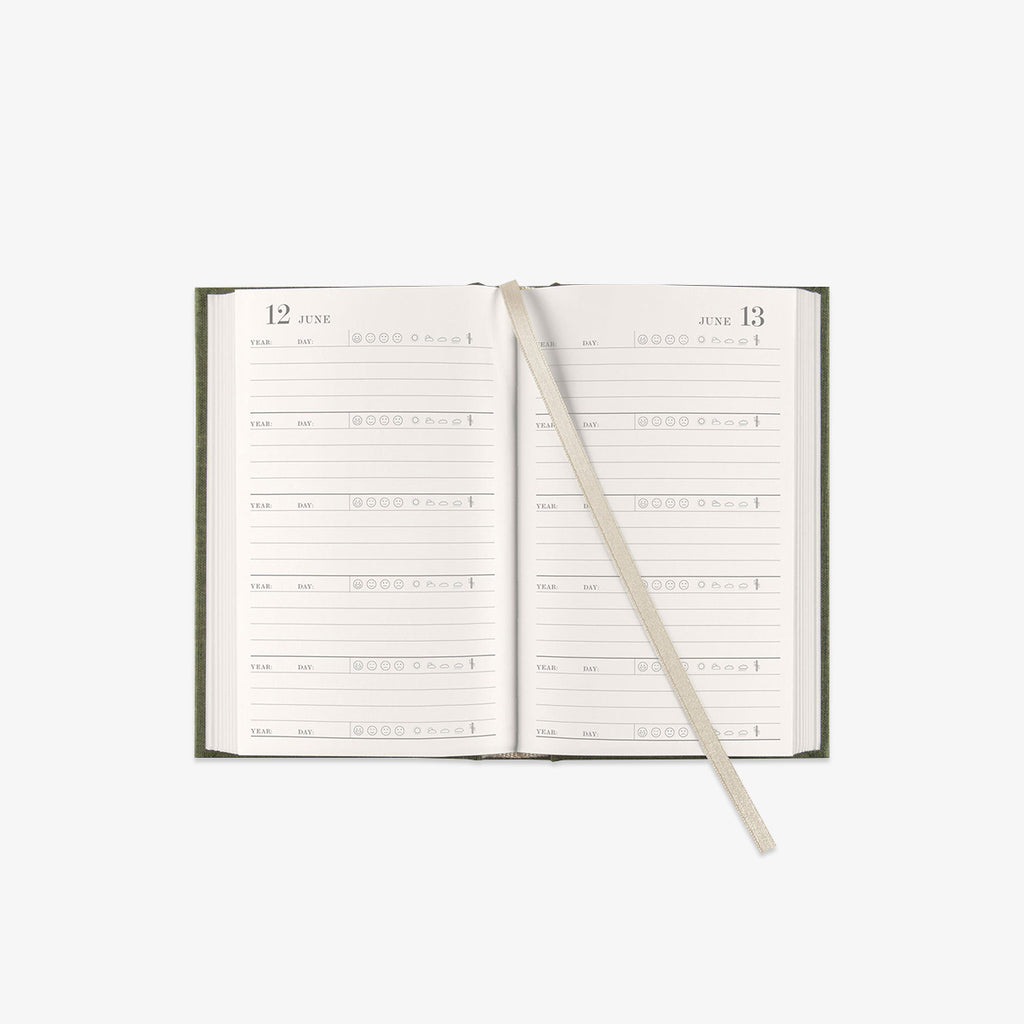 Open daily planner with a ribbon bookmark