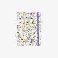 Notebook with floral and butterfly design on a white background