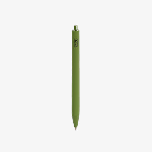 Green ballpoint pen with 'KOZO' branding on a white background