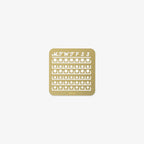 Gold calendar stencil with days of the week symbols on a white background