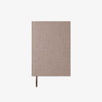 Beige fabric-bound notebook 