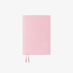 Pink notebook on a white background