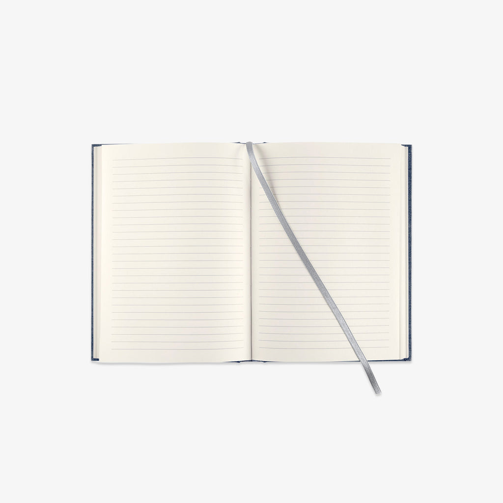 Linned hardcover notebook in dark denim with ruled pages