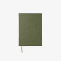 Green notebook with a textured cover 