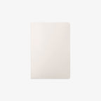 White rectangular plain and blank notebook on a white background