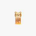 Bear-shaped pencil sharpener with the tex' dream big' on a grey background