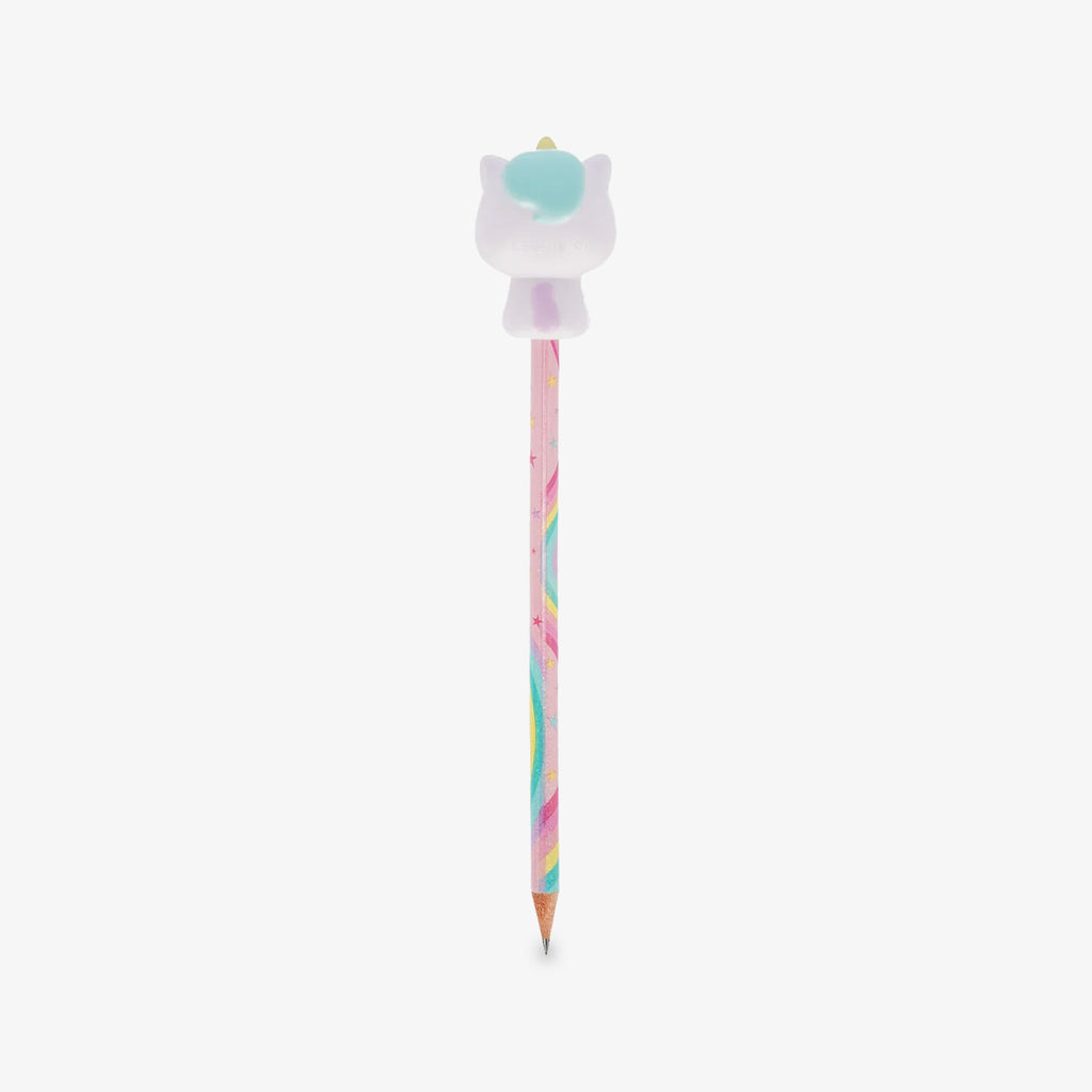 A pastel-colored pencil with a the back of a cute cartoon unicorn squishy character on top, set against a plain light gray background.