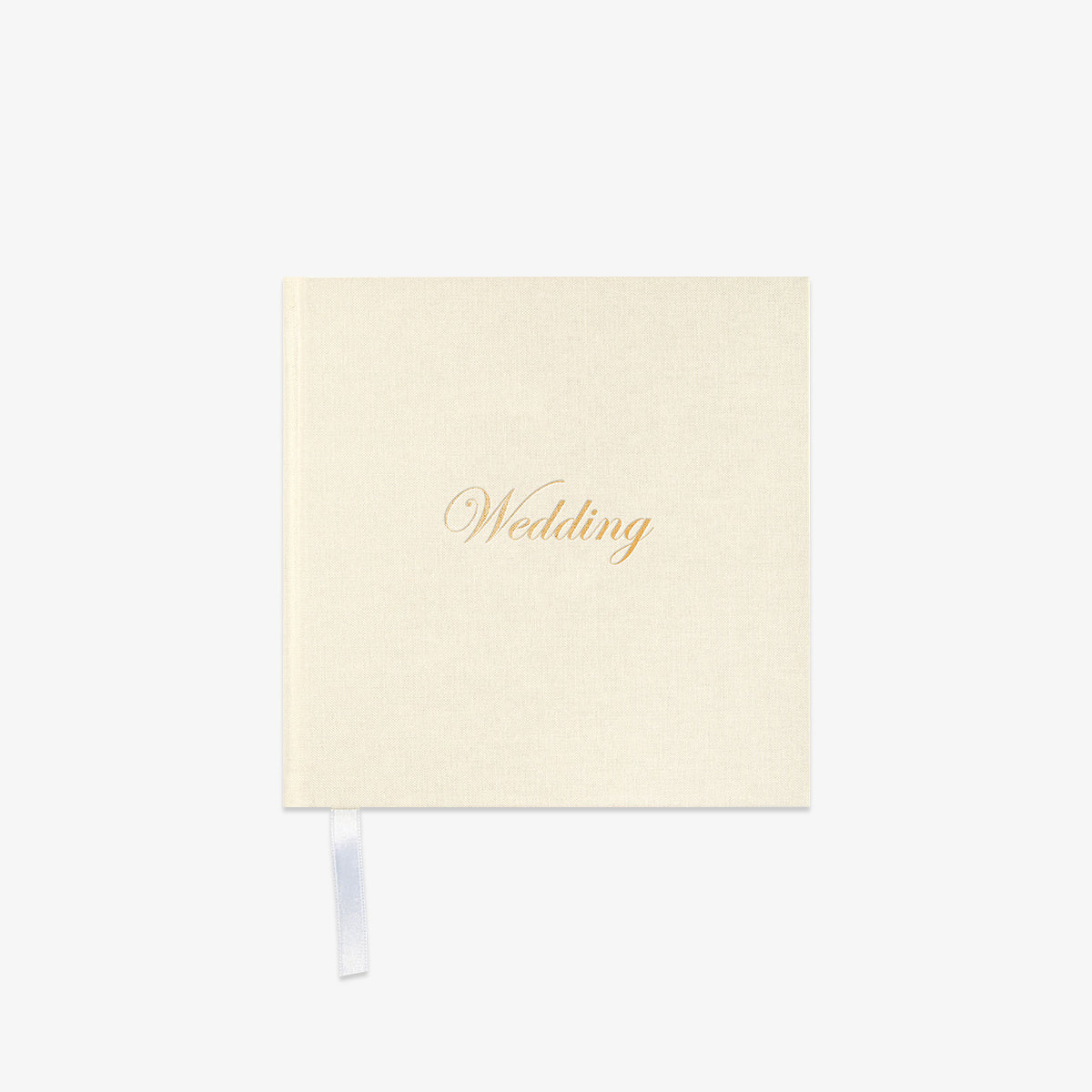 Cream-colored notebook with 'Wedding' in gold text o