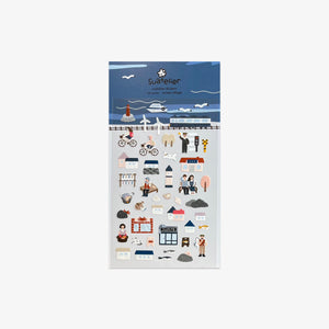 Sticker sheet with ocean village illustrations on a blue and white background