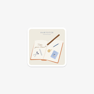 Vinyl sticker with stationery items, Kartotek Copenhagen logo and 'Take your time' text on a white background
