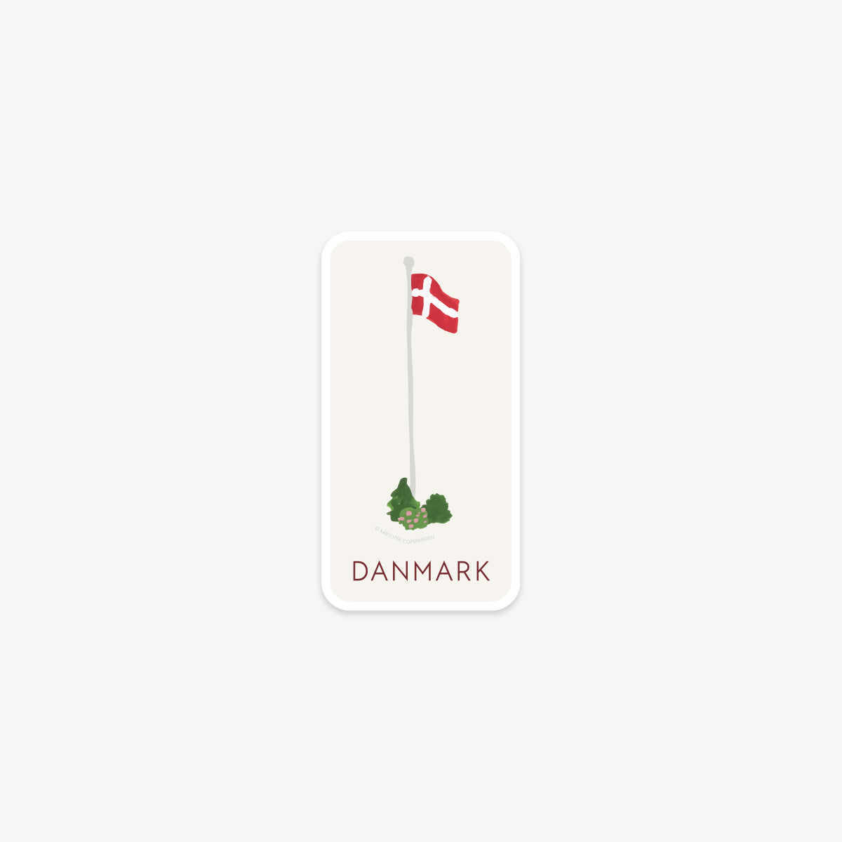 Vinyl sticker with a Danish flag and green bushes on a white background