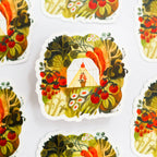 Decorative stickers with vintage-style designs featuring nature and buildings on a white background.