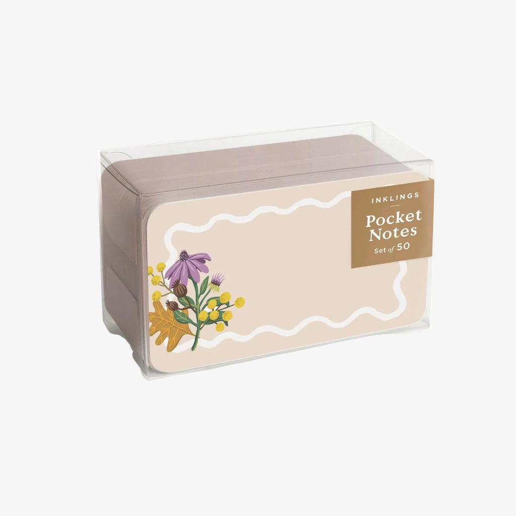 Box of pocket notes with floral design and 'Inklings' branding on a white background