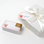 Pack of pocket notes with a decorative box on a white background
