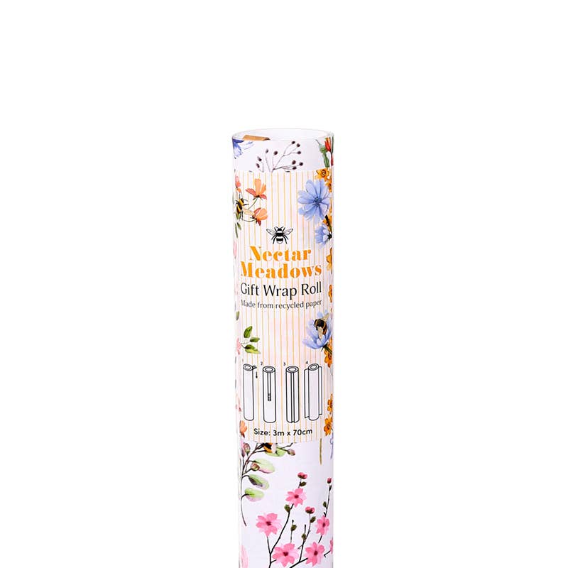 A single roll of Nectar Meadows gift wrap standing upright on a plain white background. The packaging label features a white base with vertical orange stripes and a delicate floral border in pink, blue, yellow, and green.