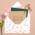 Greeting card and envelope with stamps