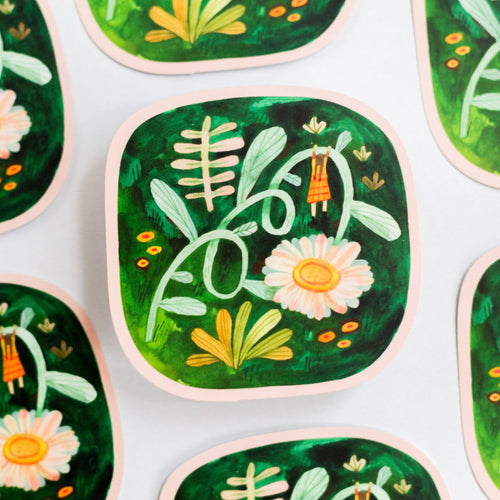 Decorative stickers with floral and leaf designs on a white background